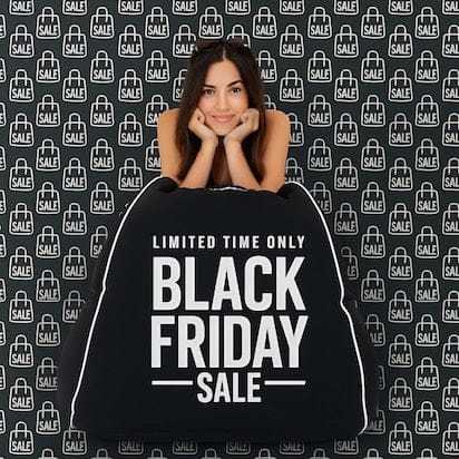Woman sitting on a black bean bag chair with 'Black Friday Sale' text against a sale-themed background