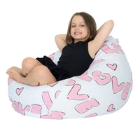 Child sitting inside a bean bag with 'LOVE' and heart patterns on a white background