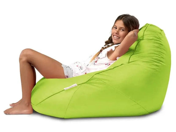 Person sitting on a green bean bag chair against a white background